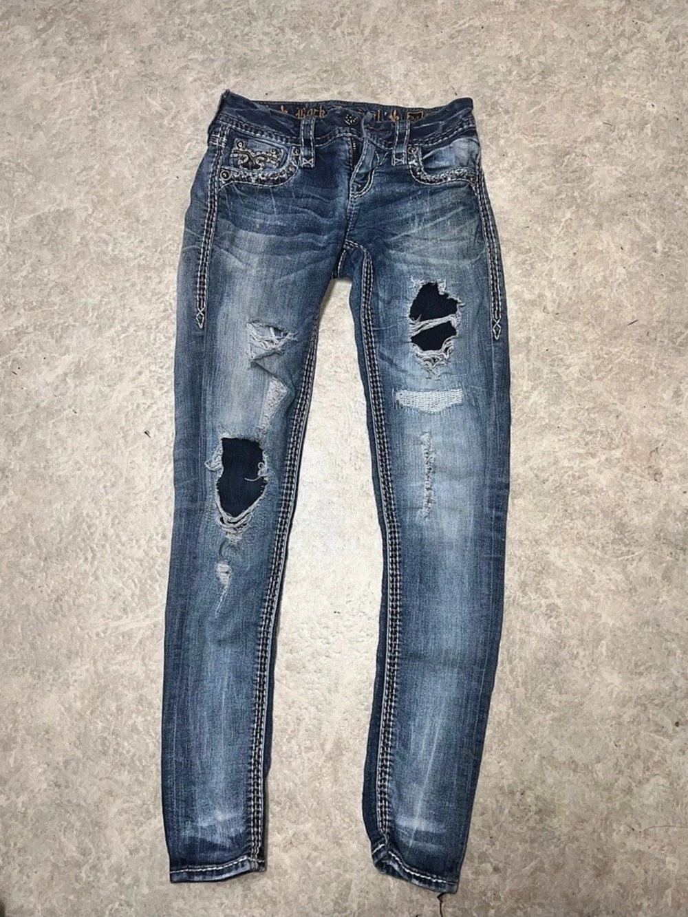 Rock Revival Distressed Skinny Jeans in Blue Waist 24 / 00